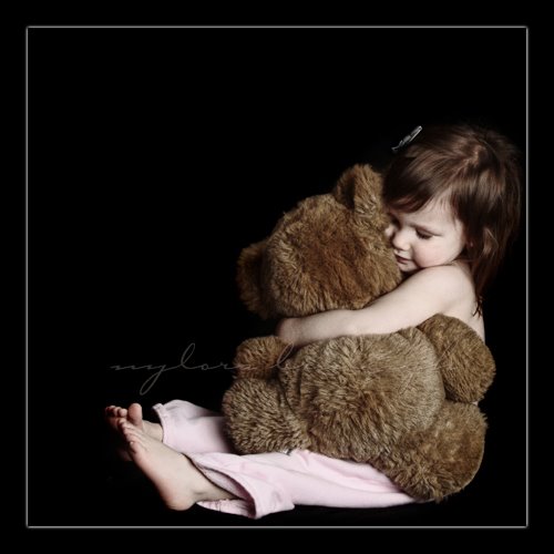 girl-hugs-bear